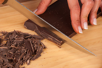 Image showing Chopping dark chocolate