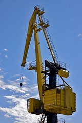 Image showing sky clouds and yellow crane  argentina