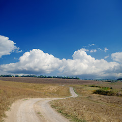 Image showing rural road under dramatic cloudy sky