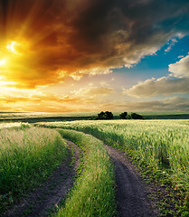 Image showing dramatic sunset over road to horizon