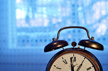 Image showing old-fashioned copper alarm clock  