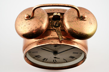 Image showing vintage copper alarm clock  