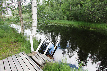 Image showing swimming pond and in water ramps