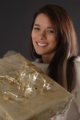 Image showing Woman holding gift