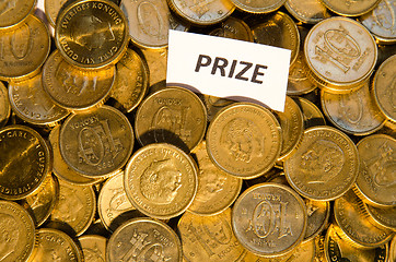 Image showing Prize sign at a stack of golden coins