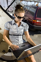 Image showing woman has a fan with laptop