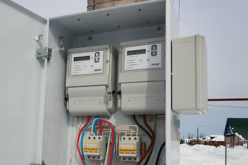 Image showing Two electric meter in a  locker