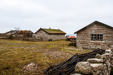 Image showing Stonehouses on shore