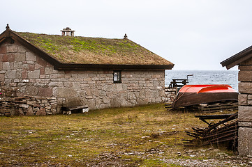 Image showing Stone house on shore