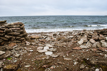 Image showing Stone wall and shore