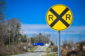 Image showing yellow railroad tracks sign