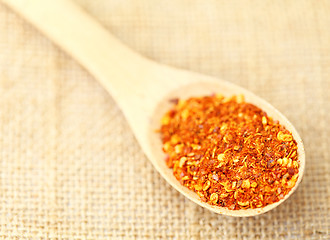 Image showing Chili powder on wooden spoon