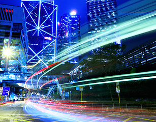 Image showing moving car with blur light through city at night