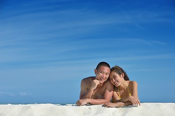 Image showing happy young  couple enjoying summer on beach