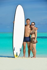 Image showing happy young  couple enjoying summer on beach