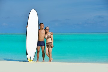 Image showing happy young  couple enjoying summer on beach