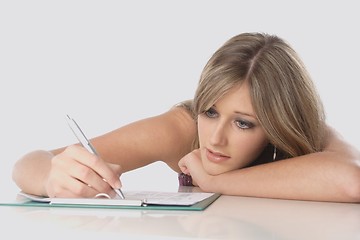 Image showing Woman writing