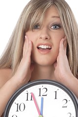 Image showing woman with clock