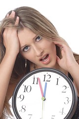 Image showing woman with clock