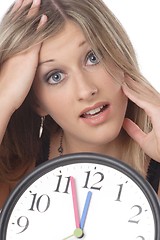 Image showing woman with clock