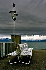 Image showing  bench and autumn in river mera 