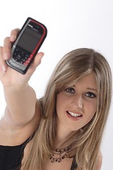 Image showing Woman showing mobile