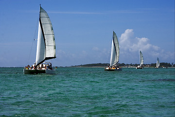 Image showing navigable  froth cloudy  catamaran and coastline