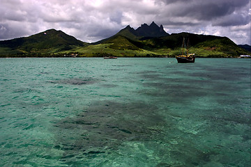 Image showing tropical lagoon hill navigable     boat  and coastline in Deer I