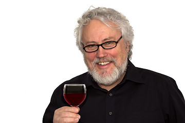 Image showing A senior and red wine