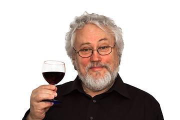 Image showing A senior and red wine