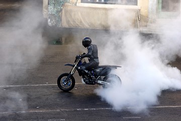 Image showing Biker performing stunt