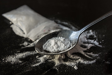 Image showing Heroin being cooked in a spoon
