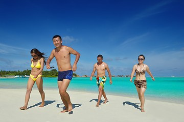 Image showing group of happy young people have fun on bach