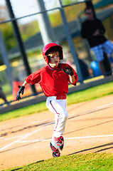 Image showing Little league baseball player running