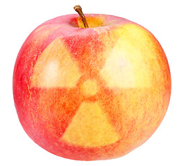 Image showing Red apple with sign of nuclear danger