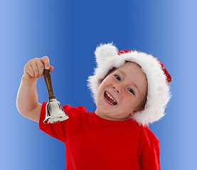 Image showing Happy child ringing hand bell