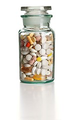 Image showing Full chemistry bottle with colorful pills