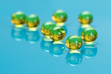 Image showing Macro of E vitamines on blue