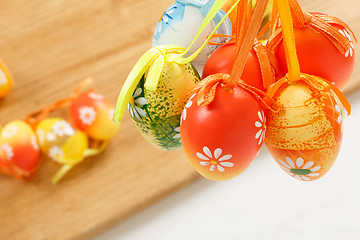 Image showing hanged bright color easter eggs