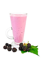 Image showing Milkshake in a tall glass with blackberry and leaf
