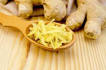 Image showing Ginger fresh on a wooden board