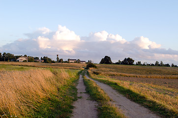 Image showing rural gravel road agriculture field farm buildings 
