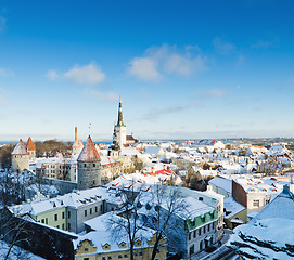 Image showing A view over the rooftops of old Tallinn frosty morning