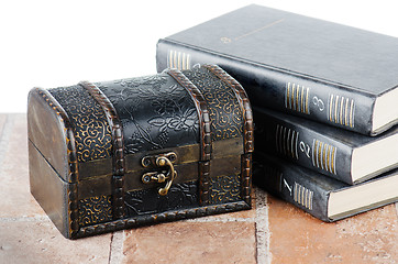 Image showing Chest and pile of books