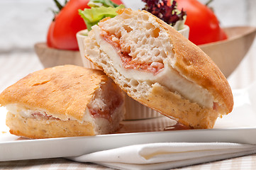 Image showing ciabatta panini sandwich with parma ham and tomato