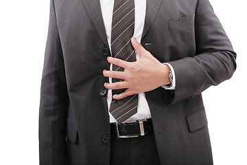 Image showing Businessman holding his stomach in pain or indigestion 