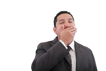 Image showing Exhausted sad businessman covering his mouth by hand