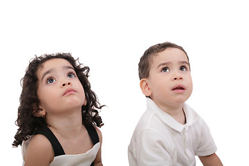 Image showing children looking up isolated on white 