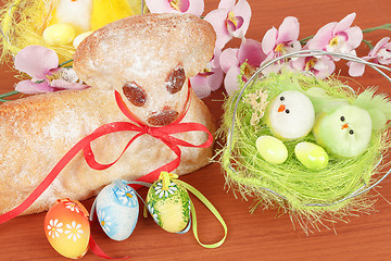 Image showing Easter lamb with painted eggs and nest