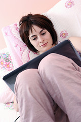 Image showing Young woman with laptop 